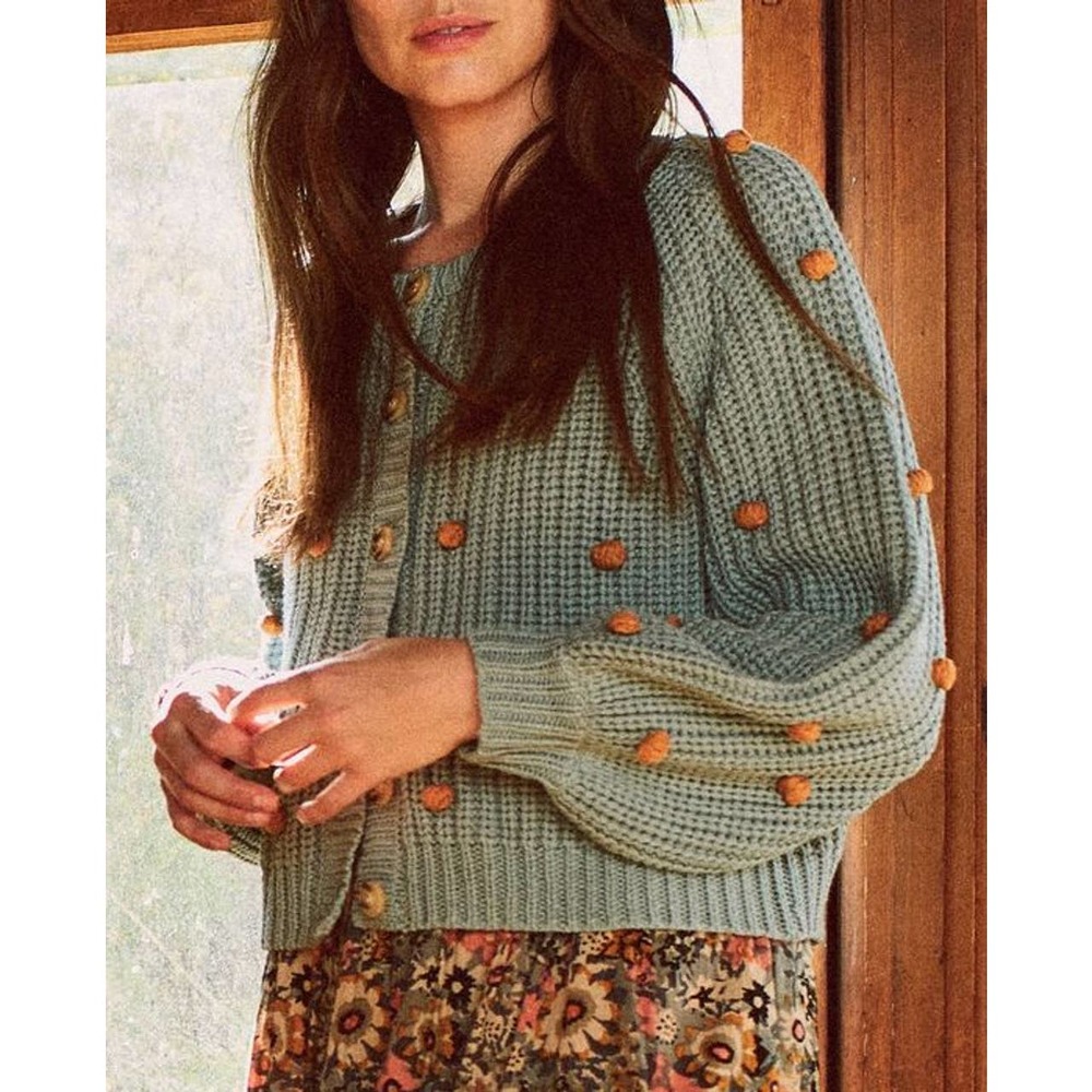 THE GREAT. Seafoam Green Knit Cardigan with Mustard Pom Details